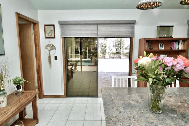entryway featuring tile patterned flooring
