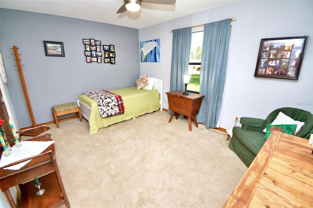 bedroom with carpet and a ceiling fan