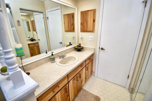 bathroom with vanity and tile patterned floors