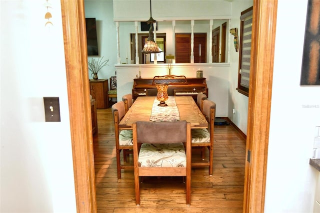 dining room featuring hardwood / wood-style flooring