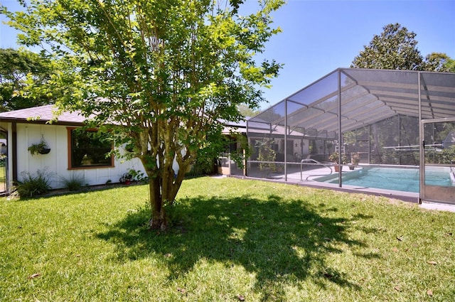 view of yard with an outdoor pool