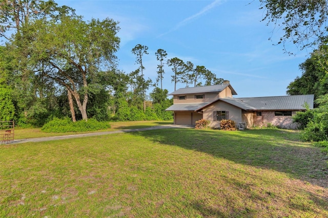exterior space with an attached garage and driveway