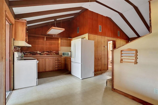 kitchen featuring wooden walls, under cabinet range hood, vaulted ceiling with beams, and white appliances