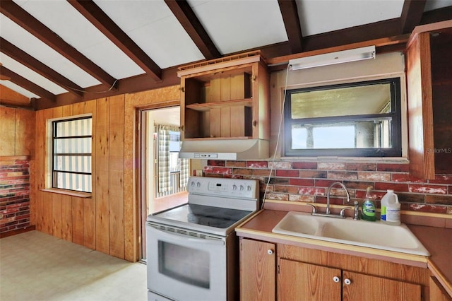kitchen featuring a sink, vaulted ceiling with beams, wooden walls, under cabinet range hood, and white range with electric cooktop