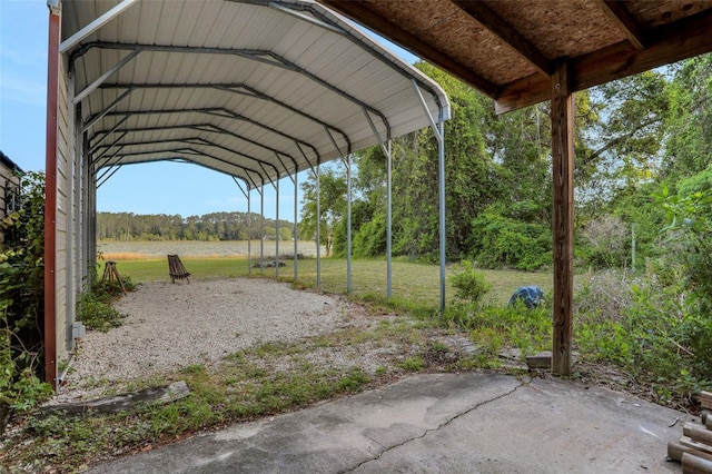 view of parking with a detached carport