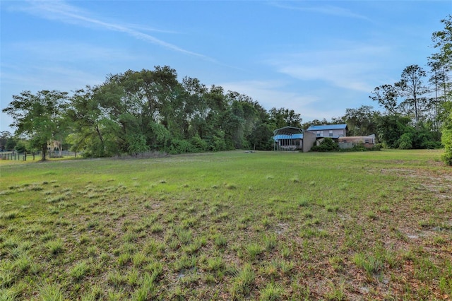 view of yard with a detached carport
