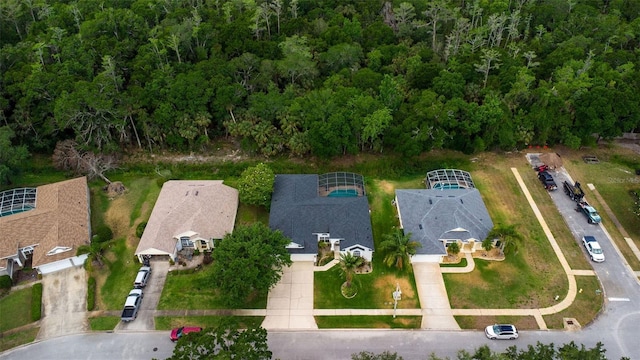 aerial view featuring a view of trees