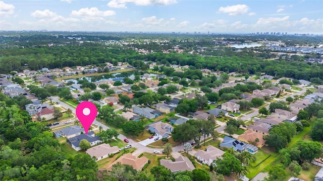 aerial view featuring a water view and a residential view