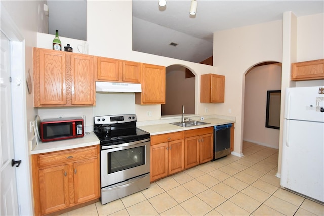 kitchen with stainless steel electric range oven, a sink, freestanding refrigerator, black dishwasher, and lofted ceiling