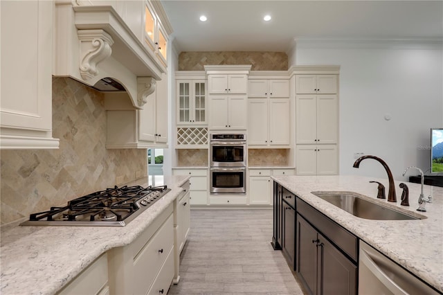 45 King Palm Ct, Ponte Vedra, FL 32081 - kitchen featuring a sink, stainless steel appliances, white cabinetry, custom exhaust hood, and recessed lighting