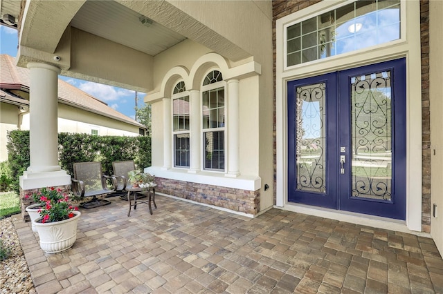 45 King Palm Ct, Ponte Vedra, FL 32081 - entrance to property featuring french doors and covered porch