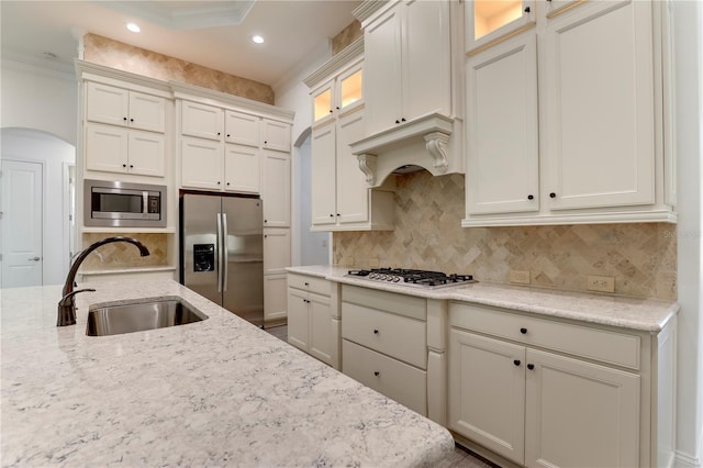 45 King Palm Ct, Ponte Vedra, FL 32081 - kitchen with a sink, stainless steel appliances, glass insert cabinets, recessed lighting, and backsplash