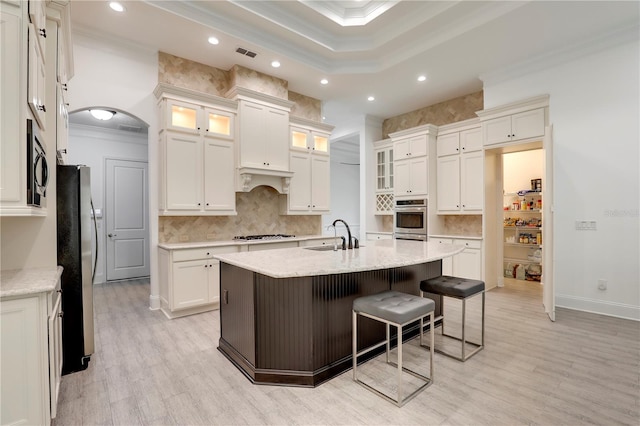 45 King Palm Ct, Ponte Vedra, FL 32081 - kitchen featuring appliances with stainless steel finishes, crown molding, recessed lighting, a sink, and decorative backsplash