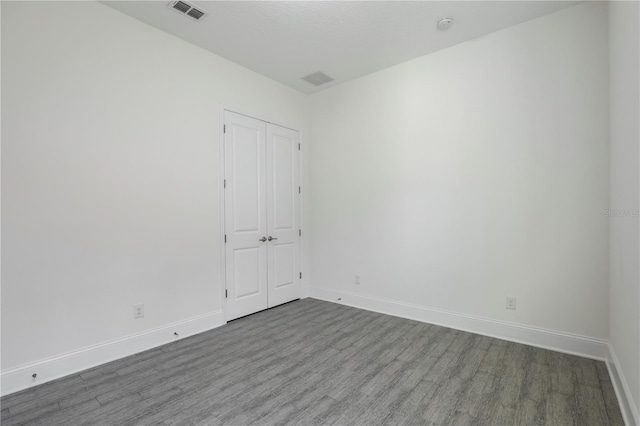 45 King Palm Ct, Ponte Vedra, FL 32081 - empty room with wood finished floors, baseboards, and a smoke detector