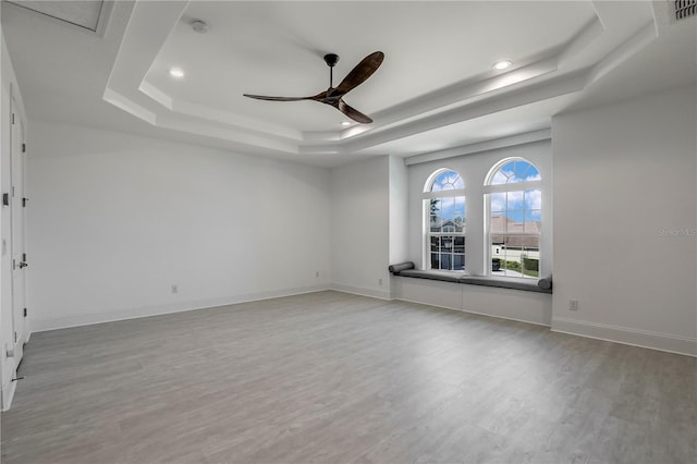 45 King Palm Ct, Ponte Vedra, FL 32081 - empty room featuring a tray ceiling, a ceiling fan, wood finished floors, recessed lighting, and baseboards