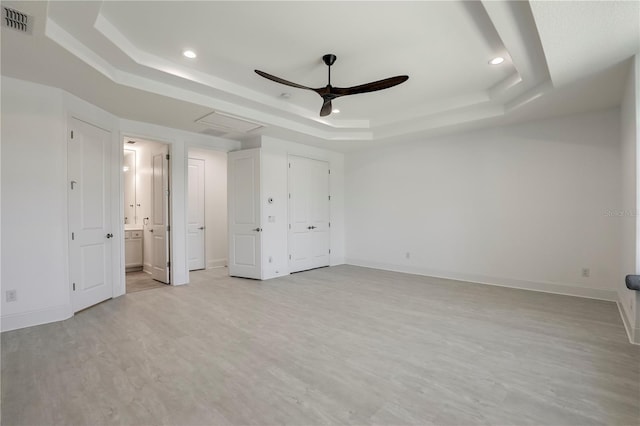 45 King Palm Ct, Ponte Vedra, FL 32081 - unfurnished bedroom with a tray ceiling, light wood-type flooring, recessed lighting, and baseboards