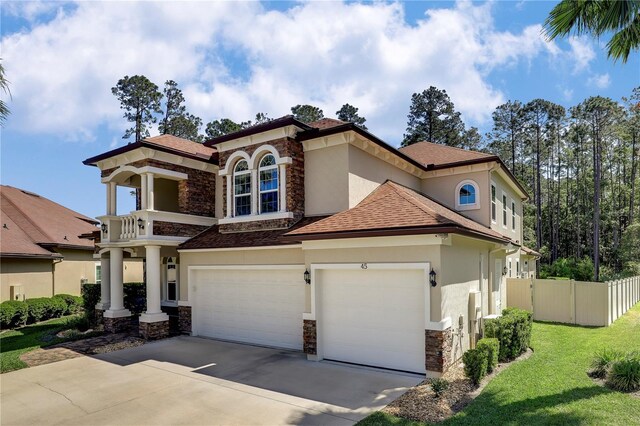 45 King Palm Ct, Ponte Vedra, FL 32081 - mediterranean / spanish-style home with stone siding, stucco siding, and concrete driveway