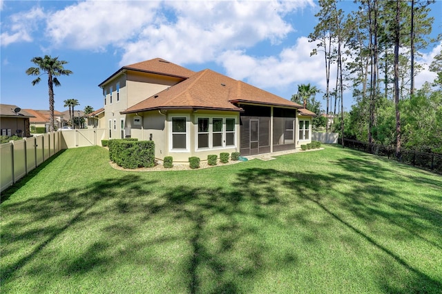 45 King Palm Ct, Ponte Vedra, FL 32081 - rear view of house with a sunroom, stucco siding, roof with shingles, and a gate