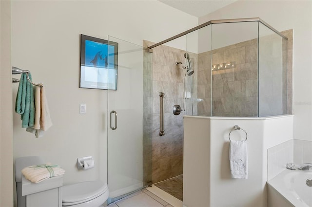 bathroom with toilet, tile patterned floors, a garden tub, and a stall shower