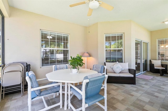 view of patio / terrace with outdoor dining area and ceiling fan