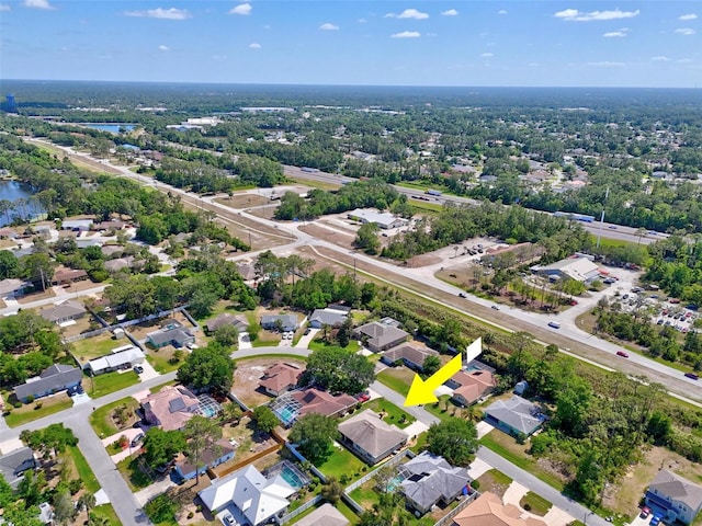 aerial view featuring a water view and a residential view