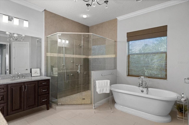 full bathroom featuring a soaking tub, a stall shower, a notable chandelier, and ornamental molding