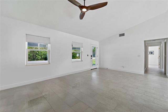 77 Freeport Ln, Palm Coast, FL 32137 - unfurnished room with a ceiling fan, high vaulted ceiling, and baseboards