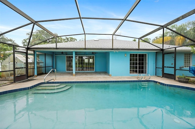 1501 Lambert Ave, Flagler Beach, FL 32136 - swimming pool featuring a patio, ceiling fan, and a lanai
