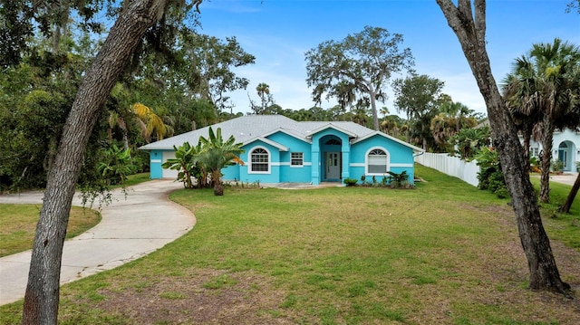 1501 Lambert Ave, Flagler Beach, FL 32136 - ranch-style home featuring concrete driveway and stucco siding