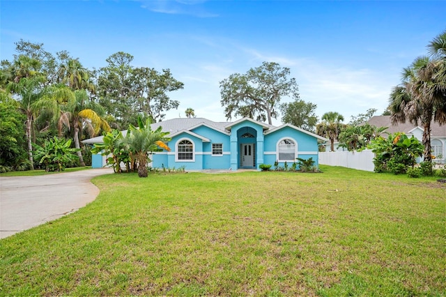 1501 Lambert Ave, Flagler Beach, FL 32136 - single story home featuring stucco siding and driveway