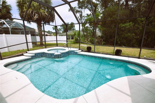 5 Baltimore Ln, Palm Coast, FL 32137 - view of swimming pool with a patio area, glass enclosure, and a pool with connected hot tub