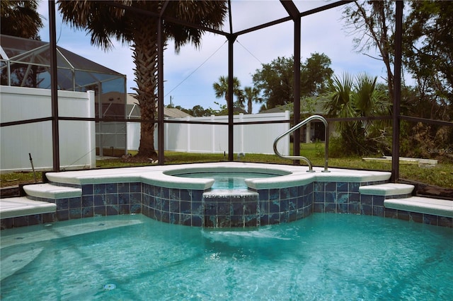 5 Baltimore Ln, Palm Coast, FL 32137 - view of swimming pool with fence and a pool with connected hot tub