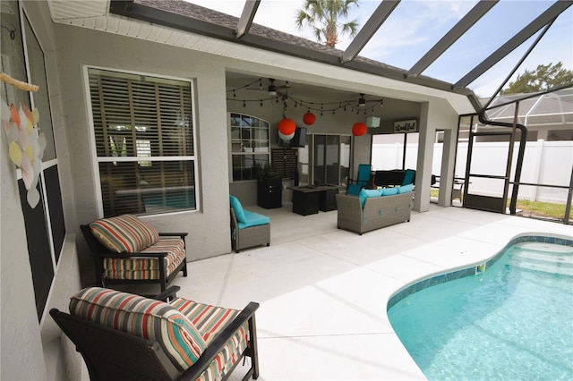 5 Baltimore Ln, Palm Coast, FL 32137 - view of pool with a fenced in pool, glass enclosure, a patio area, outdoor lounge area, and a ceiling fan