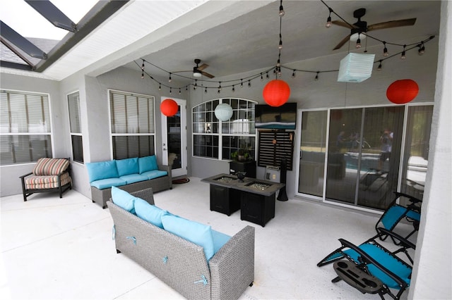 5 Baltimore Ln, Palm Coast, FL 32137 - view of patio / terrace featuring ceiling fan and an outdoor living space with a fire pit