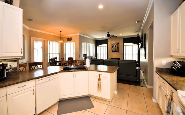 5 Baltimore Ln, Palm Coast, FL 32137 - kitchen featuring light tile patterned floors, white cabinetry, a sink, ceiling fan, and white dishwasher