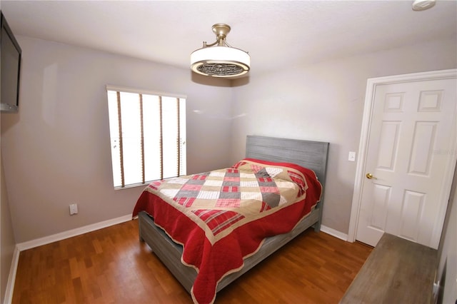 5 Baltimore Ln, Palm Coast, FL 32137 - bedroom featuring wood finished floors and baseboards
