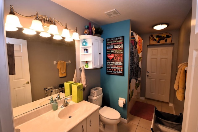 5 Baltimore Ln, Palm Coast, FL 32137 - bathroom featuring visible vents, a shower with shower curtain, toilet, vanity, and tile patterned flooring