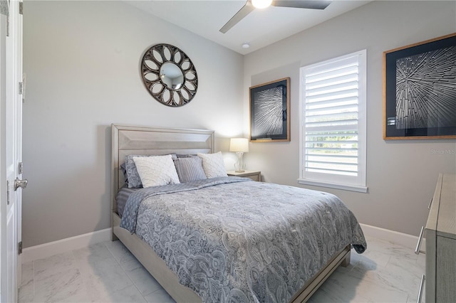 628 Mahogany Run, Palm Coast, FL 32137 - bedroom featuring marble finish floor, a ceiling fan, and baseboards