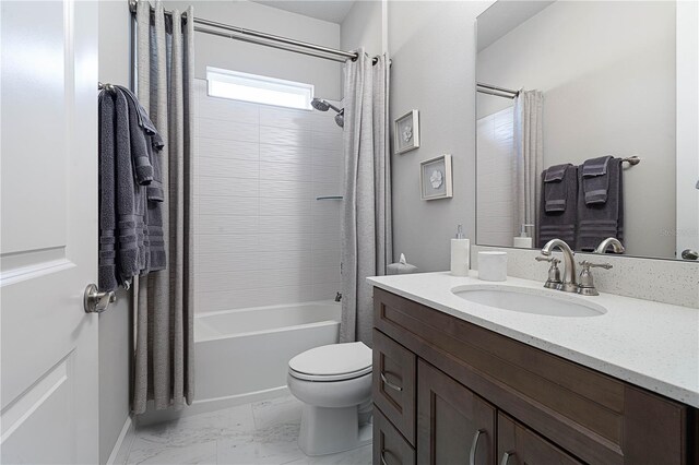 628 Mahogany Run, Palm Coast, FL 32137 - full bath featuring marble finish floor, toilet, vanity, baseboards, and shower / tub combo with curtain