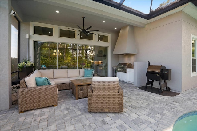 628 Mahogany Run, Palm Coast, FL 32137 - view of patio featuring an outdoor living space, area for grilling, ceiling fan, and exterior kitchen