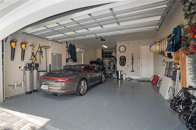 628 Mahogany Run, Palm Coast, FL 32137 - garage with a garage door opener