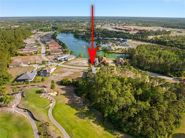 628 Mahogany Run, Palm Coast, FL 32137 - drone / aerial view with a residential view, a water view, and view of golf course
