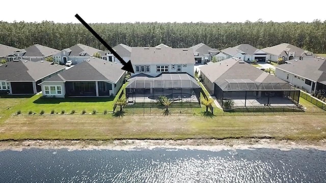 382 Aquamarine Way, Daytona Beach, FL 32124 - birds eye view of property featuring a water view, a residential view, and a view of trees