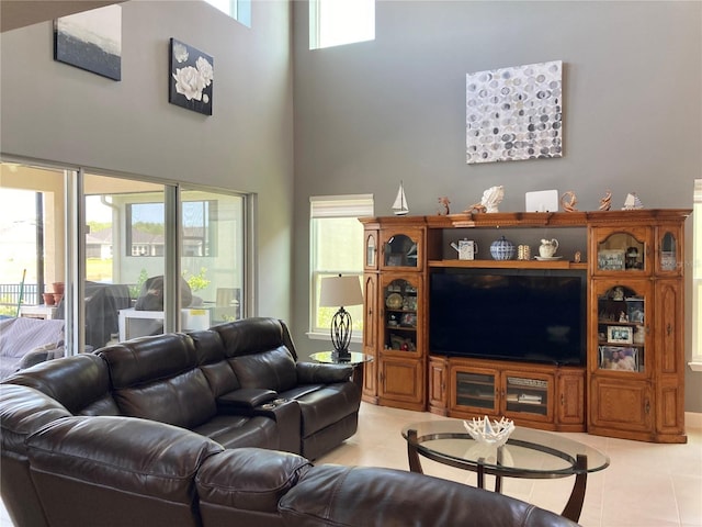 382 Aquamarine Way, Daytona Beach, FL 32124 - living area with light tile patterned floors and a towering ceiling