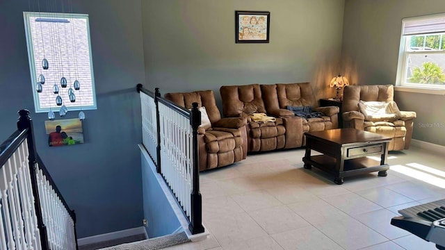 382 Aquamarine Way, Daytona Beach, FL 32124 - living room featuring light tile patterned floors and baseboards
