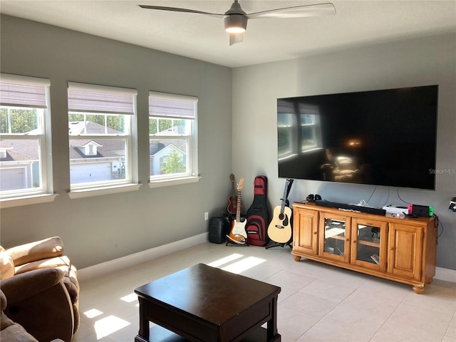 382 Aquamarine Way, Daytona Beach, FL 32124 - living room featuring baseboards, light tile patterned floors, and ceiling fan