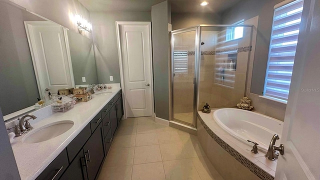 382 Aquamarine Way, Daytona Beach, FL 32124 - bathroom with a bath, double vanity, a sink, and a stall shower