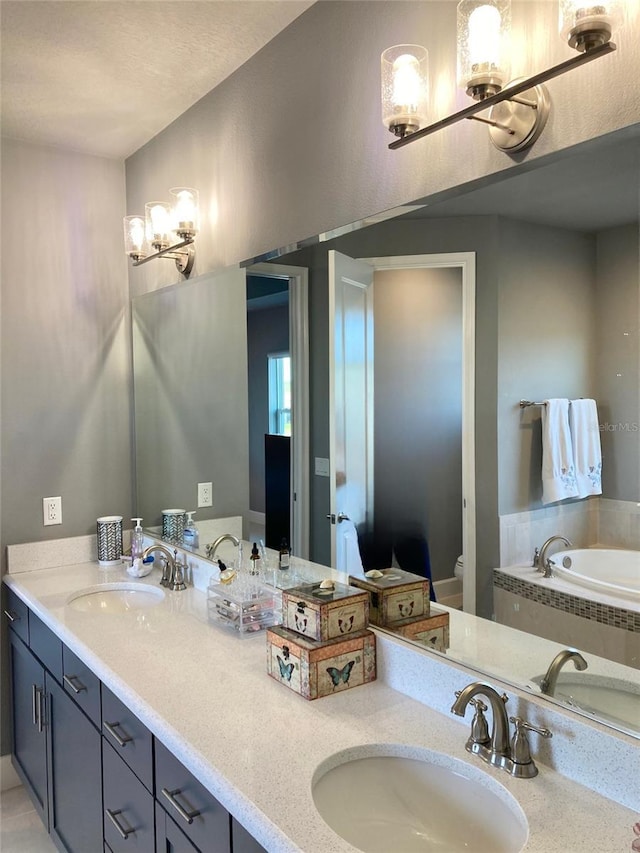 382 Aquamarine Way, Daytona Beach, FL 32124 - bathroom with toilet, double vanity, and a sink
