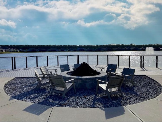 382 Aquamarine Way, Daytona Beach, FL 32124 - view of patio with an outdoor fire pit and a water view