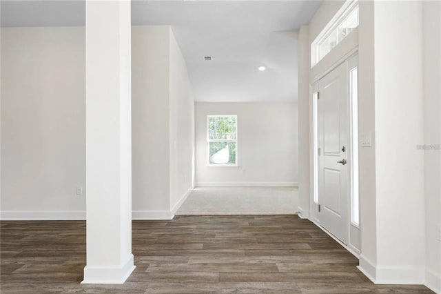 21 Uniondale Pl, Palm Coast, FL 32164 - foyer entrance with recessed lighting, wood finished floors, and baseboards